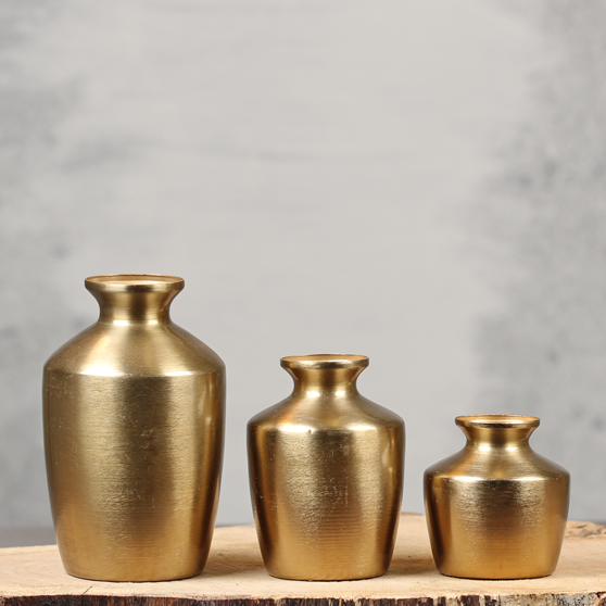Prachtige goudkleurige vaasjes | Dining Deco